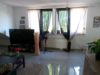 Vermietetes 3 Familienhaus in Richrath zu verkaufen - DG Wohnzimmer (2)