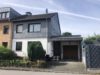 Doppelhaushälfte mit viel Platz in ruhiger Lage von Langenfeld - Vorderansicht